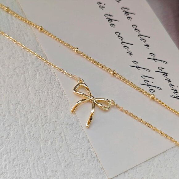 Elegant 14K Gold Bow Necklace for Women - Adjustable Dainty Choker Gift - Picture 8 of 8